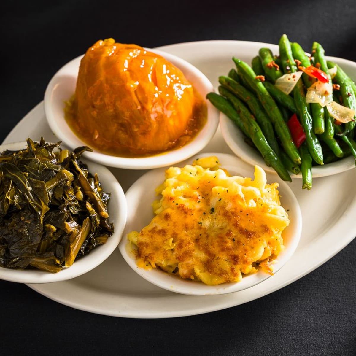 Candied yams, string beans, collard greens and macaroni and cheese